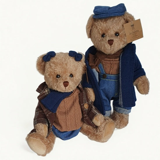 Ours en peluche en salopette, manteau et casquette