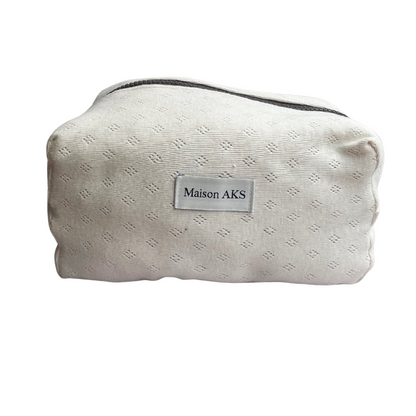 Trousse de toilette en maille pointelle crème