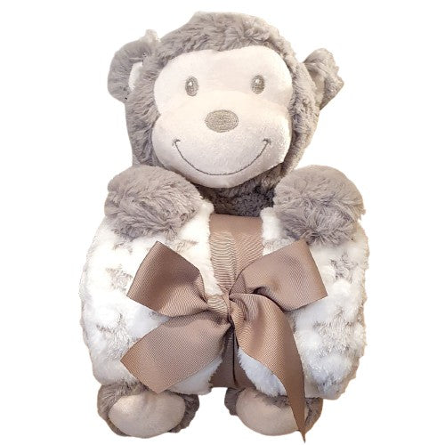 Peluche singe et son plaid