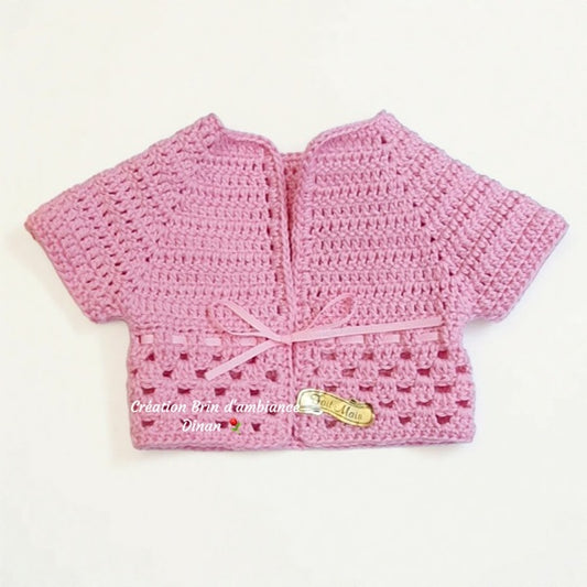 Gilet au crochet en coton rose