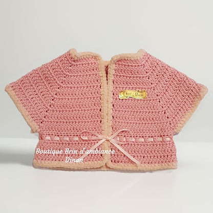 Gilet au crochet en coton rose