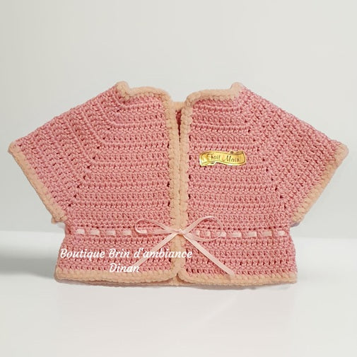 Gilet au crochet en coton rose