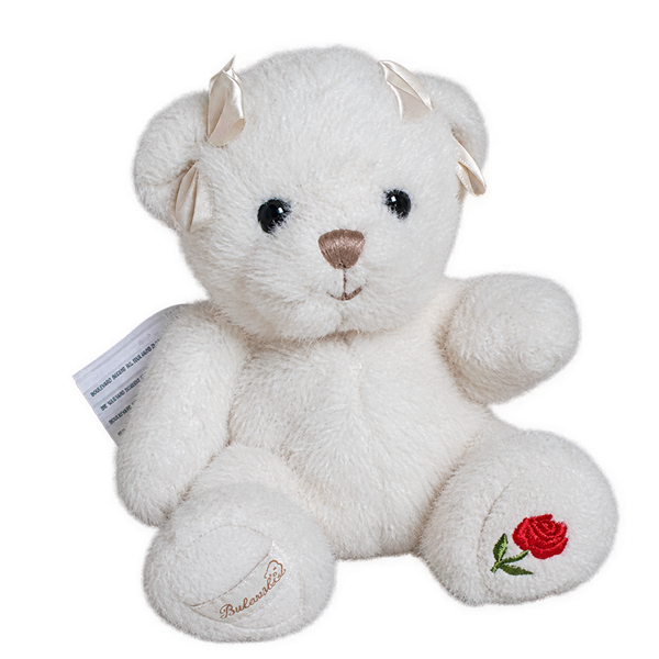 Oursonne blanche en peluche Julita avec fleur brodée